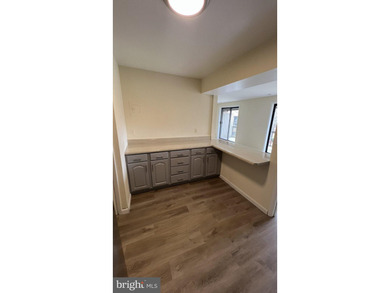 Welcome home to this beautifully refreshed top-level - photo 3