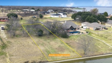 Open water view on half acre lot in subdivision on RC Lake! - photo 11