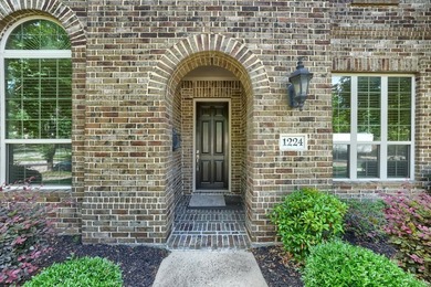 Welcome to this beautifully designed 5-bedroom, 4.5-bath home - photo 3