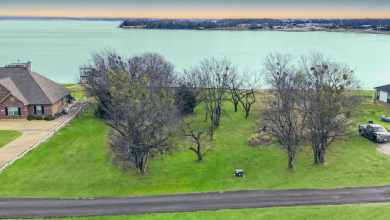 Open water view on half acre lot in subdivision on RC Lake! - photo 3