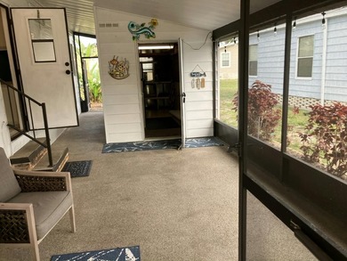 Two lanais. Front lanai has windows for year round use. Roof - photo 5