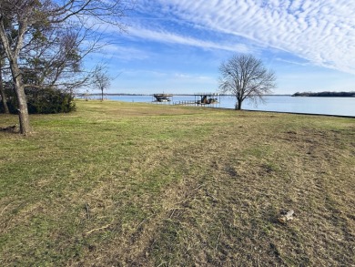 Open water view on half acre lot in subdivision on RC Lake! - photo 6