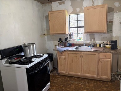 Sitting on two generous lots totaling over 8,000 sq. ft., this