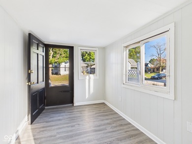 Move-in ready, handicap accessible! Discover a rare gem- an