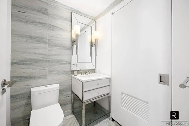 Welcome home to residence 15A at River and Warren. This sun - photo 15