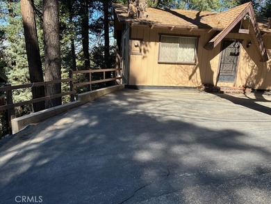 Nestled among the pines of Crestline, this charming mountain - photo 3