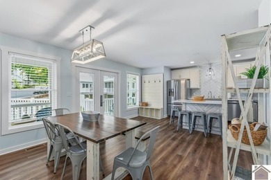 Built in 2023, this lakefront condo at Green Turtle Bay Resort & - photo 11