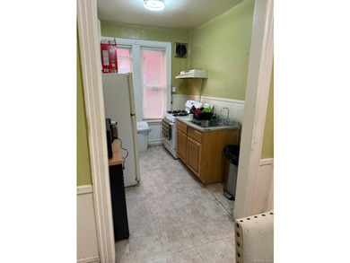 Welcome to an excellent two-family brick home in the heart of - photo 16