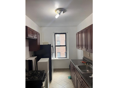 Why keep renting when you can own? This 1-bedroom, co-op offers - photo 5