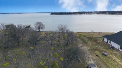 Open water view on half acre lot in subdivision on RC Lake! - photo 25