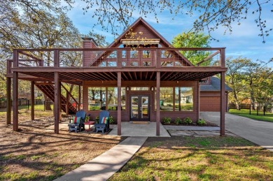 LAKE HOUSE IS LOCATED IN THE RUSSWOOD COMMUNITY. RUSSWOOD IS - Lake Home For Sale in Pottsboro, Texas