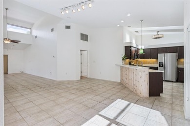 PRESENTING A BEAUTIFUL HOME ON THE GOLF COURSE! This bright and - photo 11