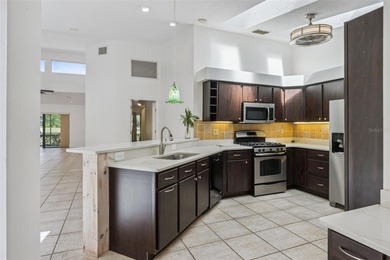 PRESENTING A BEAUTIFUL HOME ON THE GOLF COURSE! This bright and - photo 15