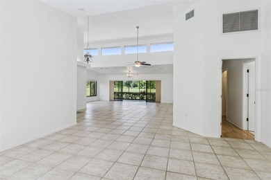 PRESENTING A BEAUTIFUL HOME ON THE GOLF COURSE! This bright and - photo 21