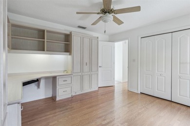 PRESENTING A BEAUTIFUL HOME ON THE GOLF COURSE! This bright and - photo 33