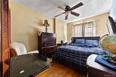 Investment opportunity in the Bronx! This legal 3-family home - photo 9