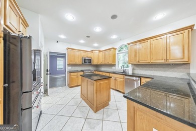 Situated on over an acre, this exceptional 5-bedroom, 4.5-bath - photo 19