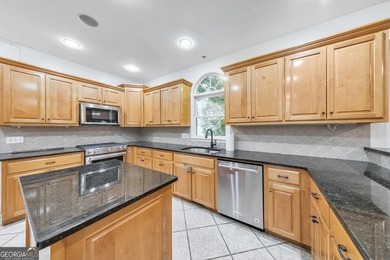 Situated on over an acre, this exceptional 5-bedroom, 4.5-bath - photo 20