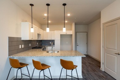 This is a luxurious 2nd floor condo, featuring the Fuquay plan