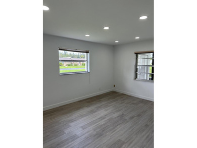 Completely renovated and move-in ready, this stunning villa - photo 19