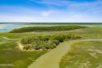 Discover an extraordinary 8-acre private island paradise, where - photo 21