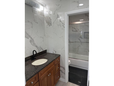 Completely renovated and move-in ready, this stunning villa - photo 21