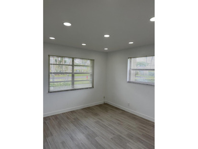 Completely renovated and move-in ready, this stunning villa - photo 23