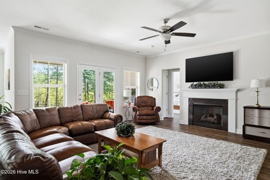 Nestled within the gated community of Seven Lakes West, this - photo 4