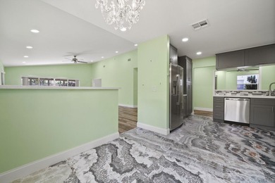Discover this beautifully renovated 3-bedroom, 2-bath residence - photo 16