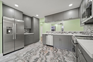 Discover this beautifully renovated 3-bedroom, 2-bath residence - photo 17