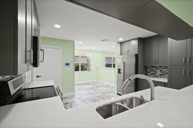 Discover this beautifully renovated 3-bedroom, 2-bath residence - photo 22