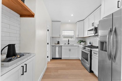 Beautifully remodeled 3-unit property offering the perfect blend - photo 25