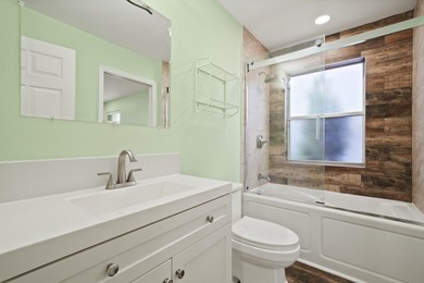 Discover this beautifully renovated 3-bedroom, 2-bath residence - photo 30