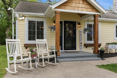 Set on nearly an acre in a close-knit lake community, this - photo 1