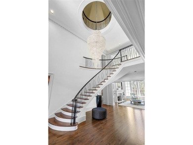 This extraordinary estate in the prestigious Windward community