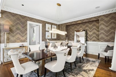 This extraordinary estate in the prestigious Windward community