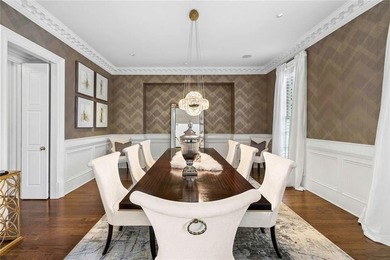 This extraordinary estate in the prestigious Windward community