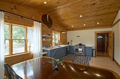 Welcome to this beautifully renovated log home tucked away in a - photo 20