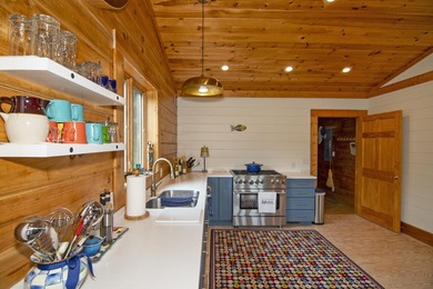Welcome to this beautifully renovated log home tucked away in a - photo 23