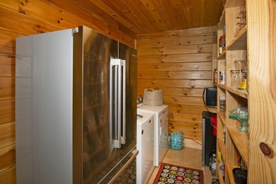 Welcome to this beautifully renovated log home tucked away in a - photo 25