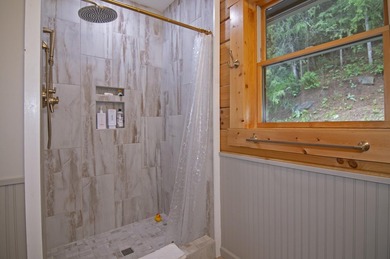 Welcome to this beautifully renovated log home tucked away in a - photo 37