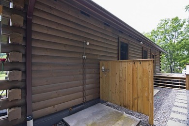 Welcome to this beautifully renovated log home tucked away in a - photo 48