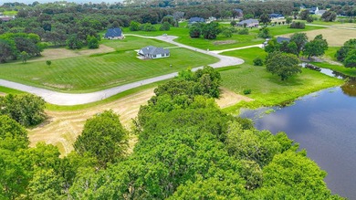 Beautiful 1 acre lot with pond in a gated community. Welcome to - photo 24