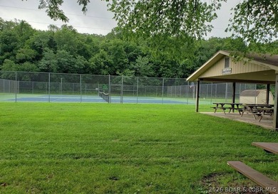 9.6 wooded acres in the gated Forbes Lake of the Ozarks Park - photo 11