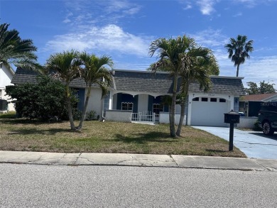 Lake Home For Sale in Holiday, Florida