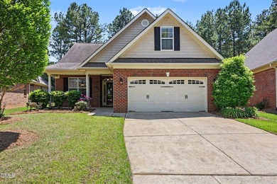Beautiful brick ranch with custom moldings, tray ceilings, and a - photo 1