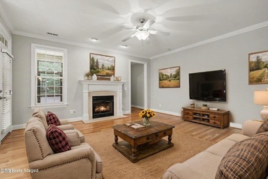 Beautiful brick ranch with custom moldings, tray ceilings, and a - photo 3