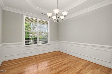 Beautiful brick ranch with custom moldings, tray ceilings, and a - photo 5