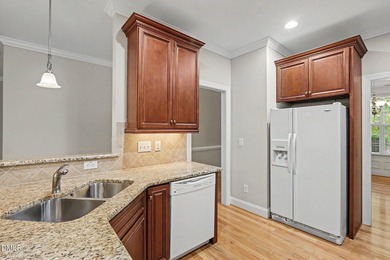 Beautiful brick ranch with custom moldings, tray ceilings, and a - photo 10