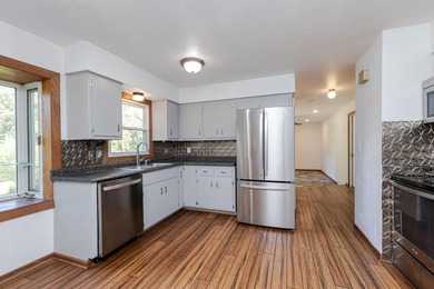Enjoy the perfect blend of space, updates, and location on this - photo 2